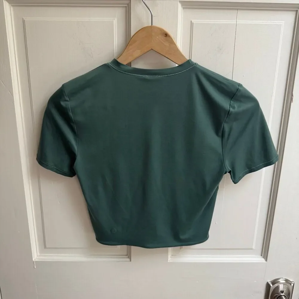 Lululemon Wundermost Ultra-Soft Nulu Cropped in Medium Forest Size Medium